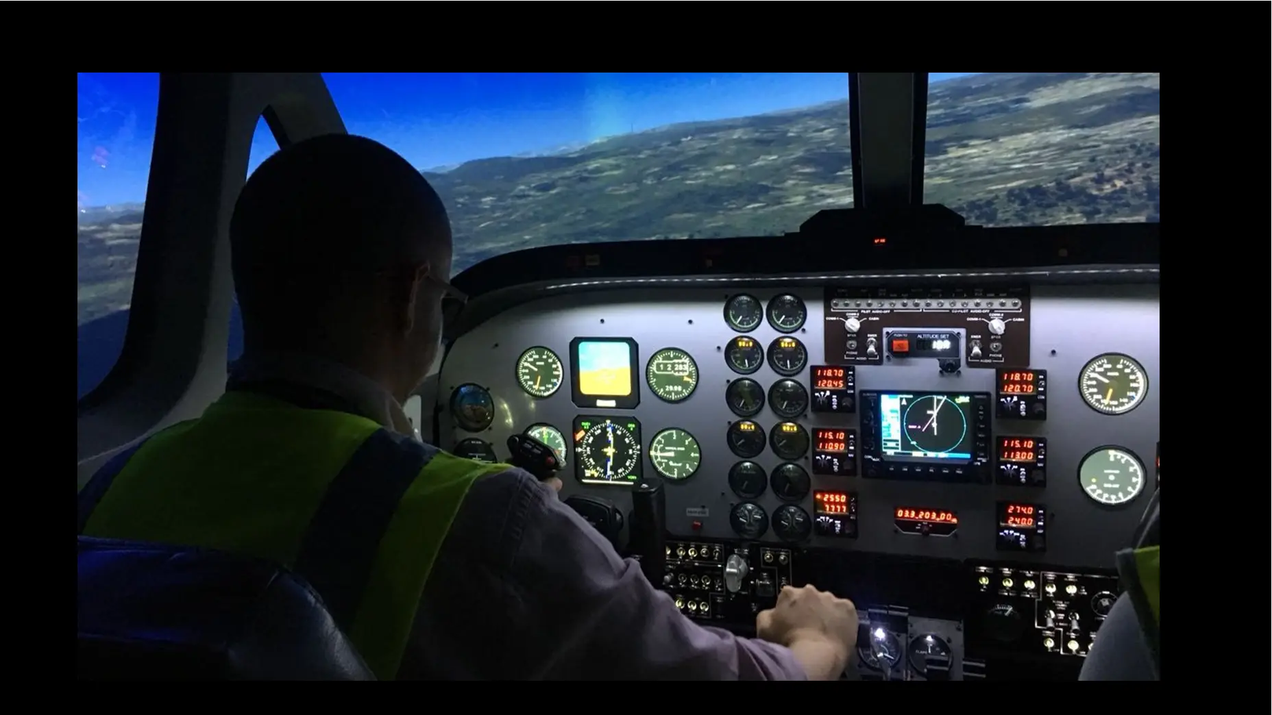 Instructor on flight simulator
