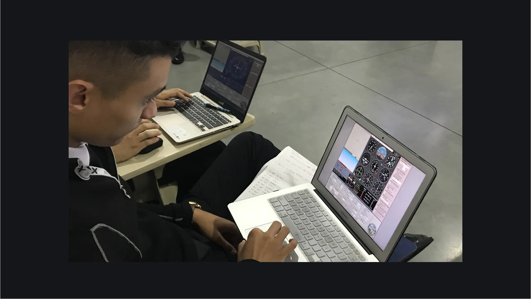 Student practicing in a flight simulator